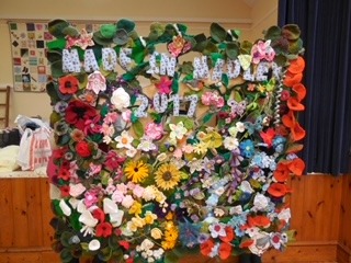 This is the Made in Madley wall hanging constructed in 2017 for the Exhibition.  In September 2021 it was decided to redo it and with help from Sylvia it was deconstructed. The wall hanging was re-made by Evelyn, Davina, Ann, Gill and Valerie and is looking lovely.